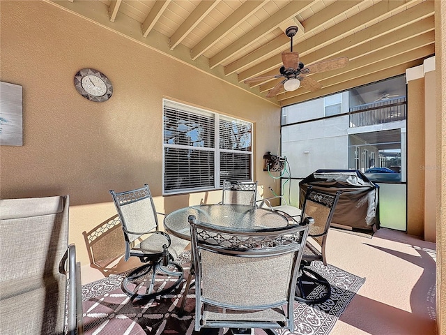 view of patio / terrace featuring outdoor dining area and a ceiling fan