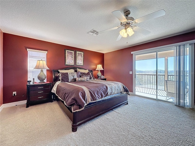 bedroom featuring access to outside, baseboards, visible vents, and light carpet