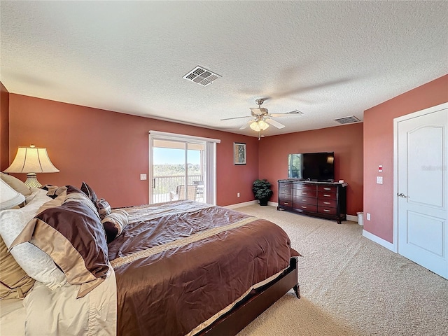 bedroom featuring visible vents, light carpet, baseboards, and access to exterior