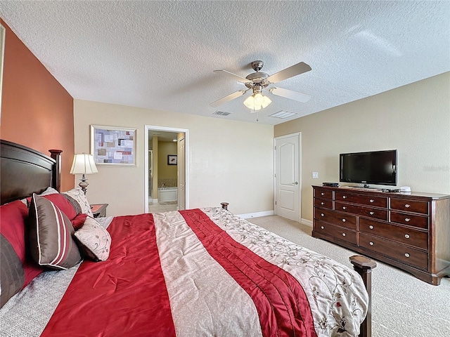 bedroom featuring visible vents, light carpet, a ceiling fan, a textured ceiling, and baseboards