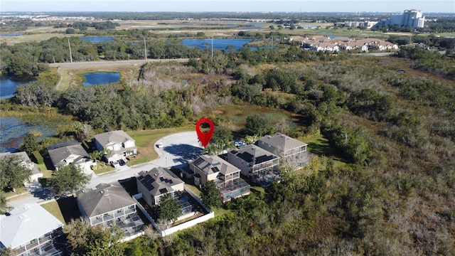 aerial view with a water view and a residential view