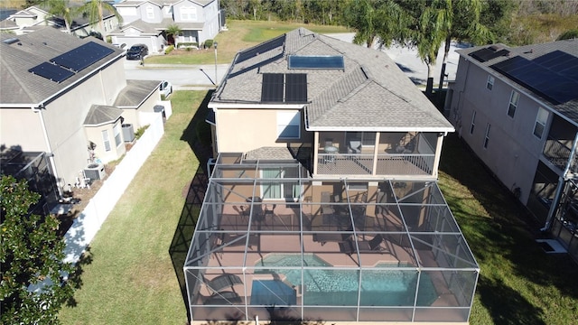 birds eye view of property with a residential view