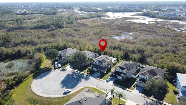 bird's eye view featuring a residential view and a view of trees