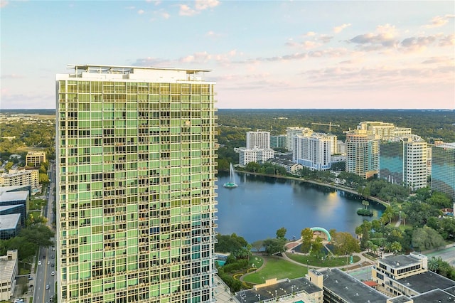 aerial view featuring a view of city and a water view