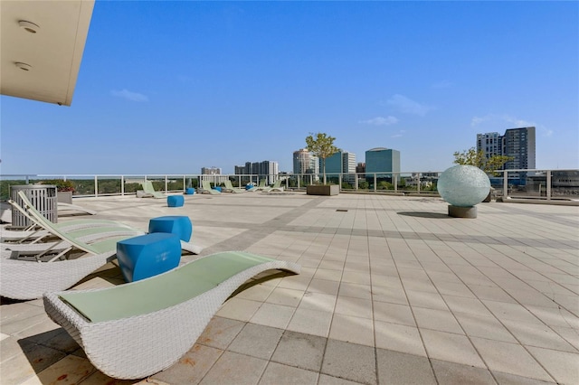 view of patio / terrace with a city view