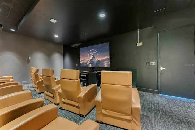 carpeted home theater room featuring recessed lighting and baseboards