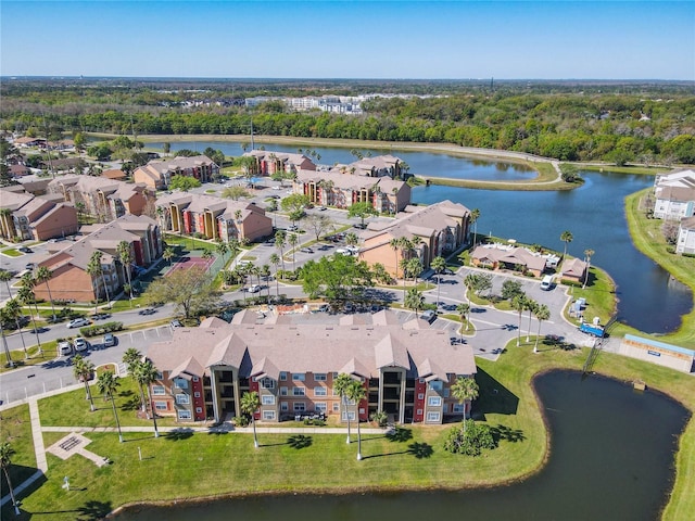 birds eye view of property featuring a residential view and a water view