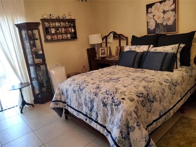 bedroom featuring tile patterned floors