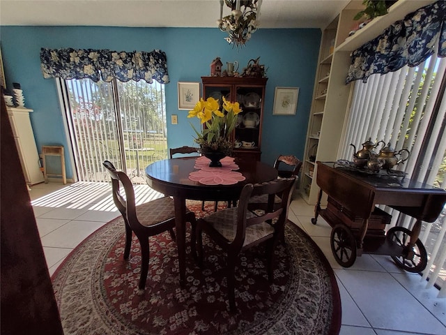 dining space with light tile patterned flooring