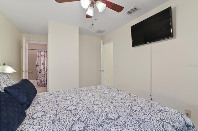 bedroom with a ceiling fan and visible vents