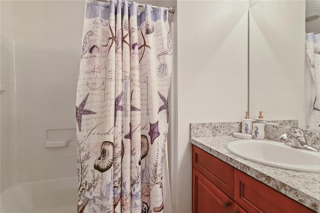 bathroom with vanity and shower / bath combo