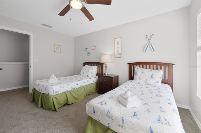 bedroom with visible vents, ceiling fan, baseboards, and carpet