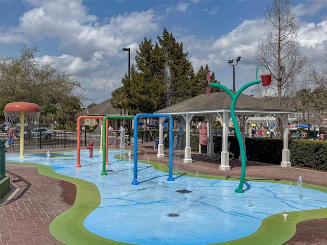 community play area featuring fence