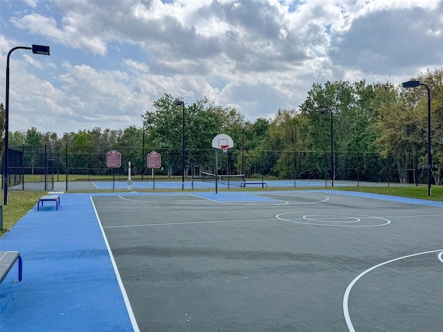 view of sport court with community basketball court and fence