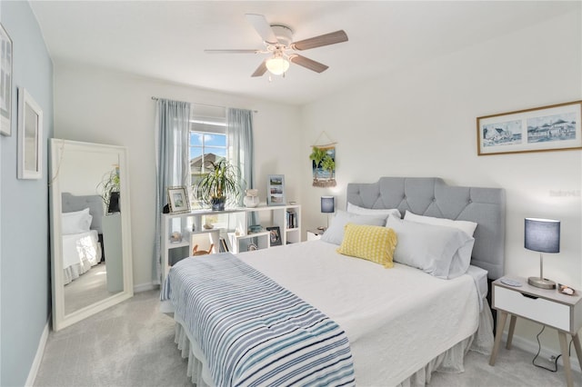 bedroom with carpet, baseboards, and ceiling fan