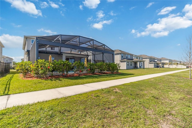 exterior space with a yard and a residential view