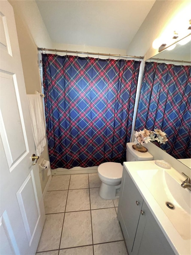 full bath with tile patterned flooring, toilet, curtained shower, and vanity