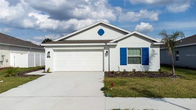 single story home with a front yard, fence, an attached garage, stucco siding, and concrete driveway