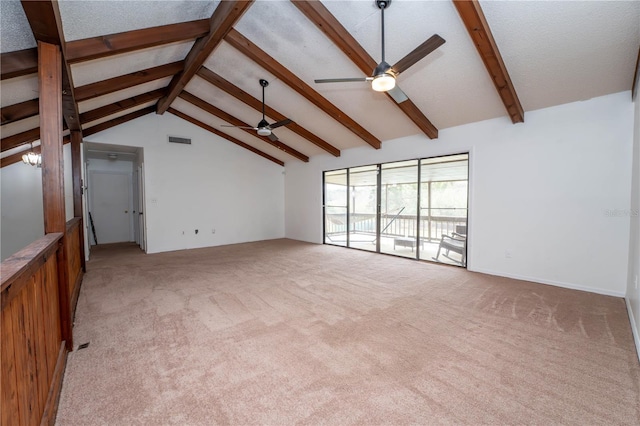 unfurnished living room with visible vents, beamed ceiling, light colored carpet, high vaulted ceiling, and a ceiling fan