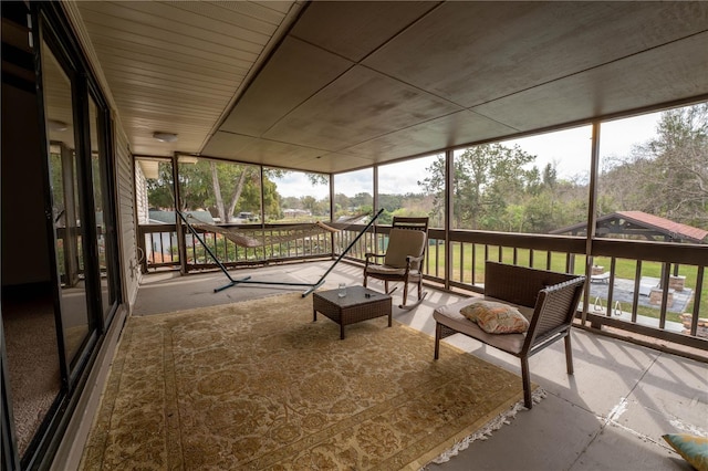 unfurnished sunroom featuring plenty of natural light