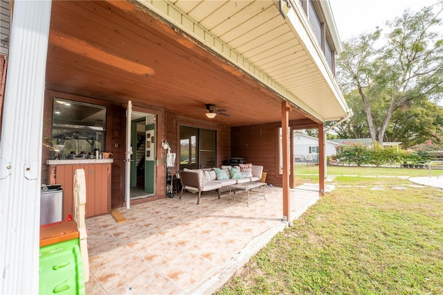 view of patio with an outdoor hangout area and ceiling fan