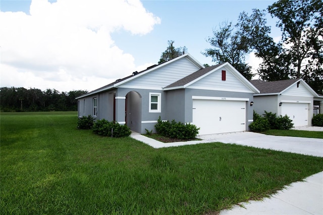 ranch-style house with a front yard, roof with shingles, stucco siding, driveway, and an attached garage