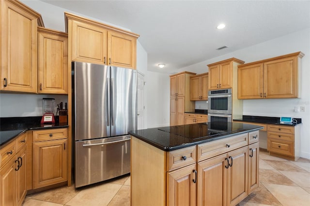 kitchen with light tile patterned floors, visible vents, recessed lighting, stainless steel appliances, and a center island