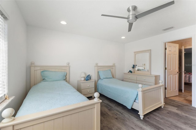 bedroom featuring recessed lighting, visible vents, wood finished floors, and a ceiling fan