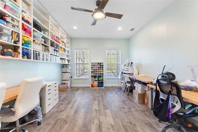 office featuring visible vents, baseboards, recessed lighting, wood finished floors, and a ceiling fan