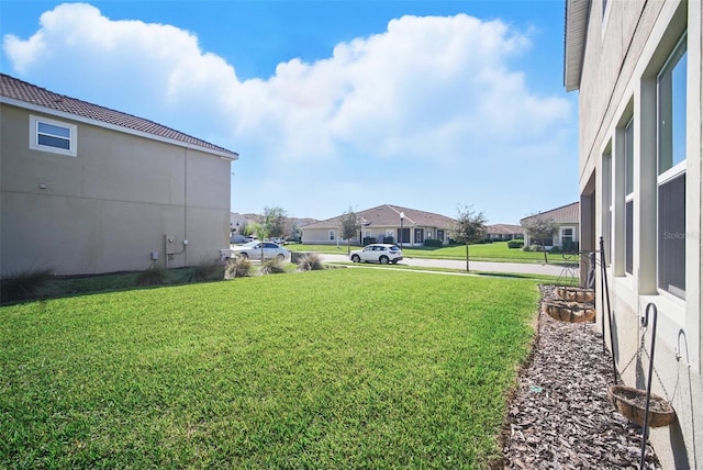 view of yard with a residential view