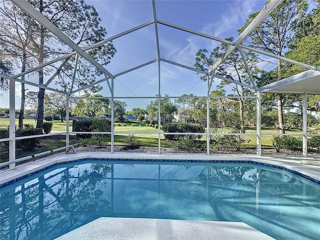 outdoor pool with glass enclosure