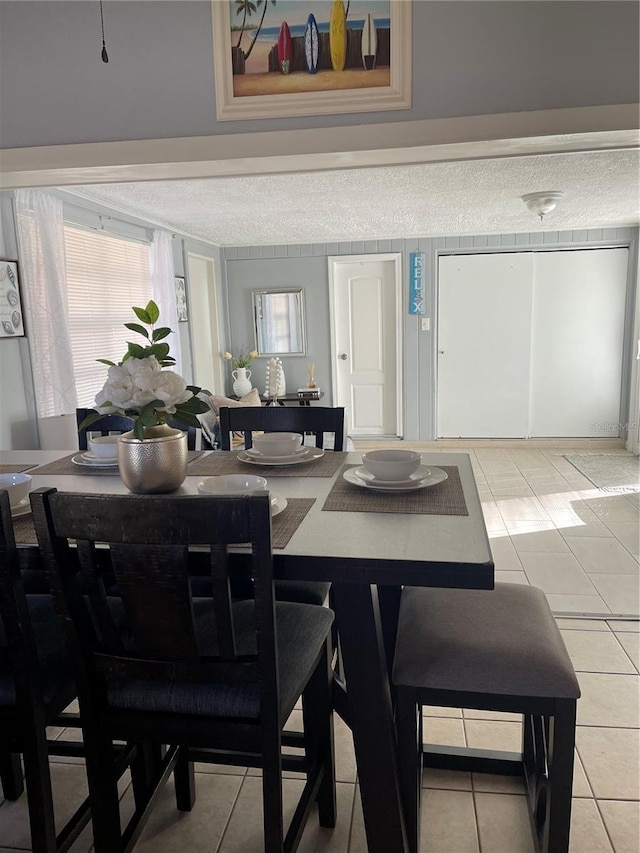 dining room featuring tile patterned flooring