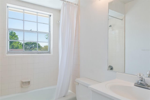 full bathroom featuring toilet, vanity, and shower / bath combo