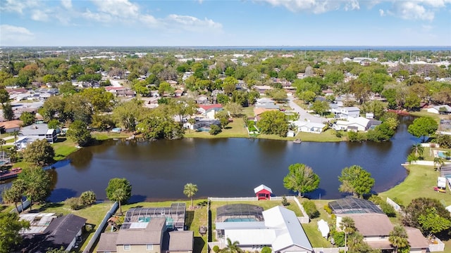 bird's eye view featuring a residential view and a water view