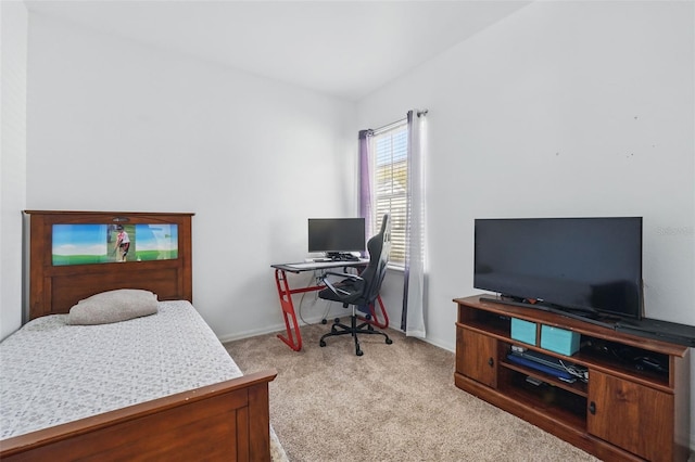 bedroom with baseboards and carpet floors