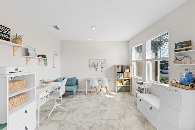 sitting room with visible vents, marble finish floor, and baseboards