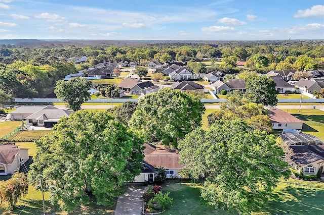 birds eye view of property with a residential view