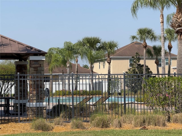 view of pool featuring a fenced in pool and fence