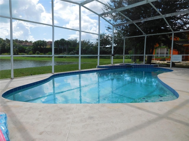 outdoor pool with an outbuilding and glass enclosure