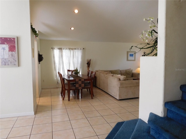 dining space featuring light tile patterned floors, recessed lighting, and baseboards