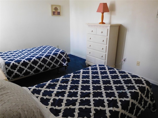 bedroom with baseboards