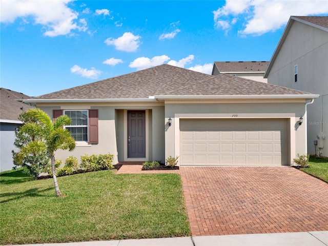 single story home featuring roof with shingles, stucco siding, a front lawn, a garage, and decorative driveway