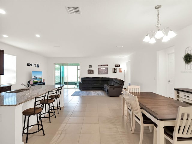 dining space featuring a notable chandelier, visible vents, recessed lighting, and light tile patterned flooring