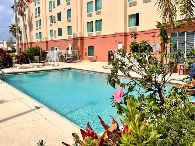 pool with a patio