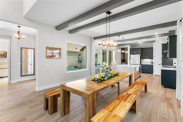 dining area with beamed ceiling, baseboards, light wood-type flooring, and an inviting chandelier