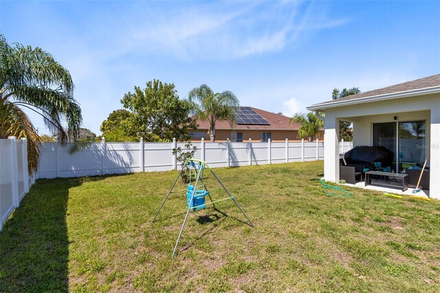 view of yard featuring a fenced backyard