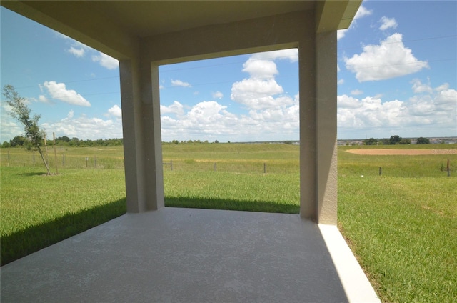 view of patio with a rural view