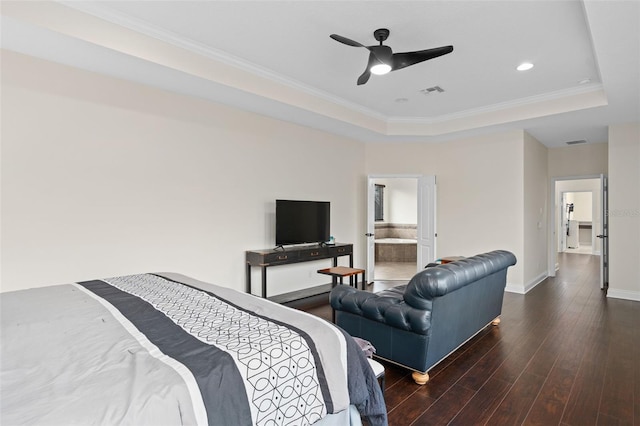 bedroom with visible vents, baseboards, ornamental molding, dark wood-style floors, and a raised ceiling