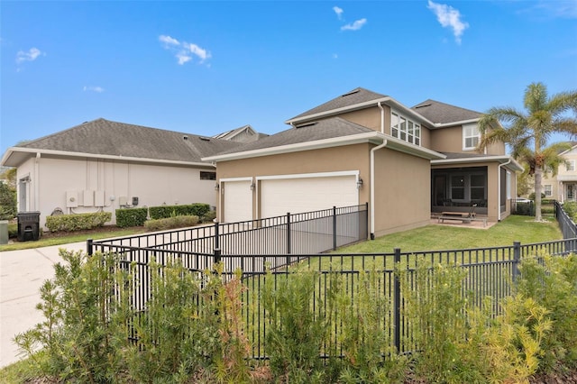 view of property exterior featuring stucco siding, a fenced backyard, concrete driveway, a sunroom, and a garage