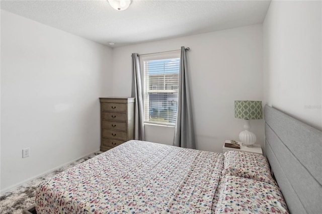 bedroom with a textured ceiling